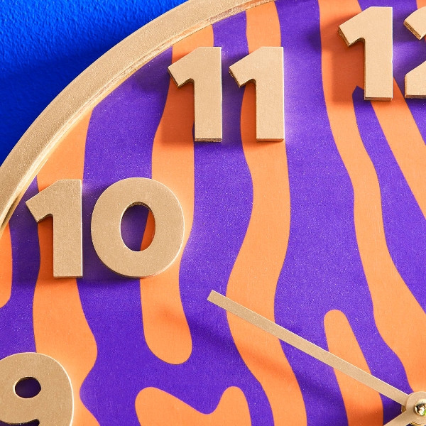 Retro Wanduhr Pop-Art Safari in Orange Lila Retro Wanduhr Pop-Art Safari in Orange Lila